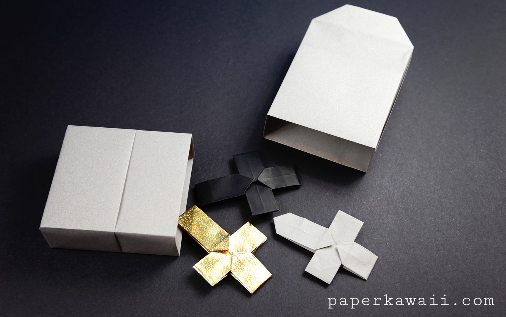 Origami Crosses inside an origami tombstone box!
