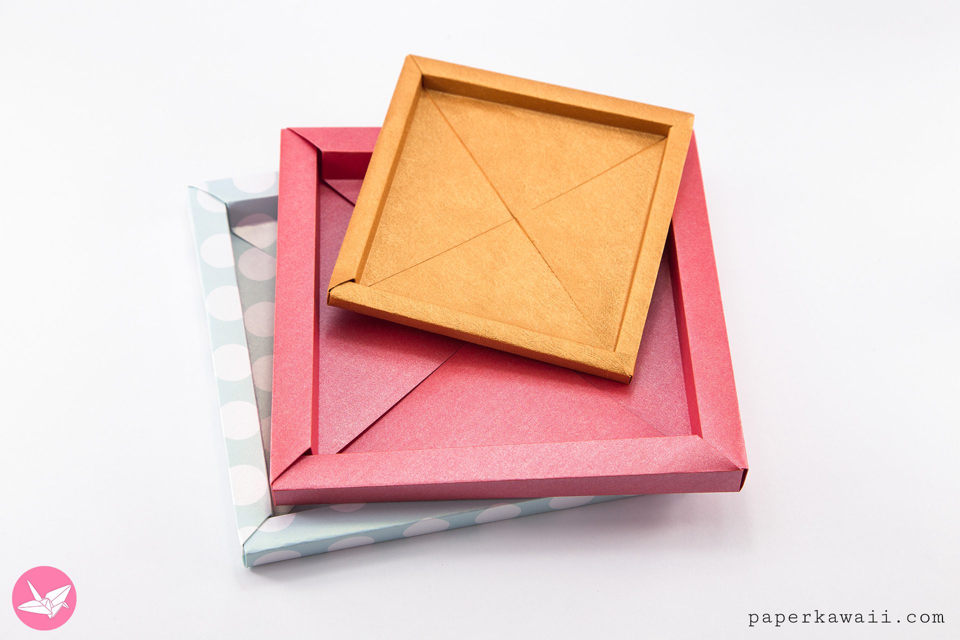 Learn how to make a 3d origami frame box can be used to display art, as a gift box or tray & it also makes a great origami paper storage box. No glue required.